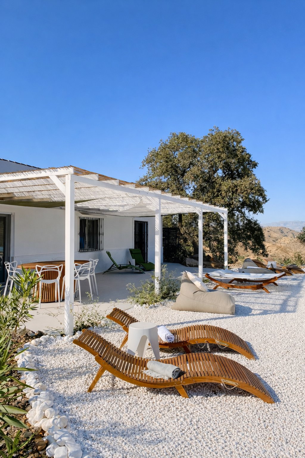 Sun loungers by the private pool at Casa Lux in Andalusia