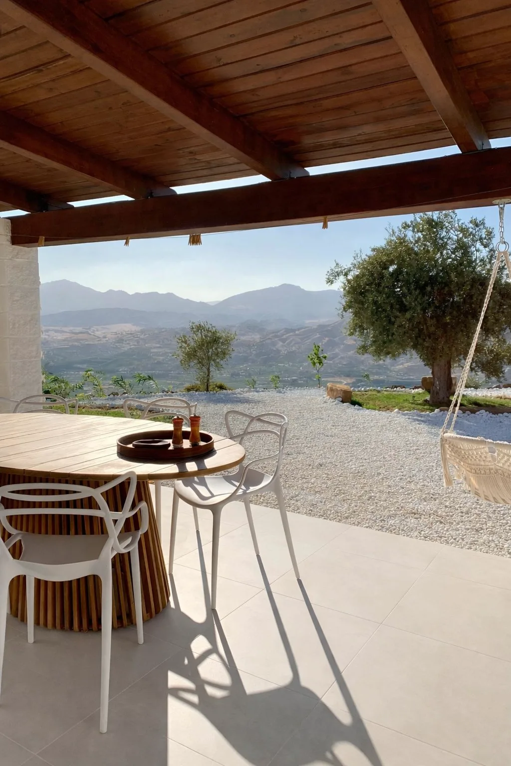 Covered dining terrace overlooking the Andalusian hills
